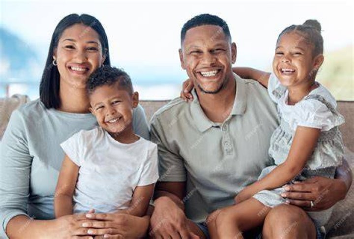 A Family Portrait Of Their Kids