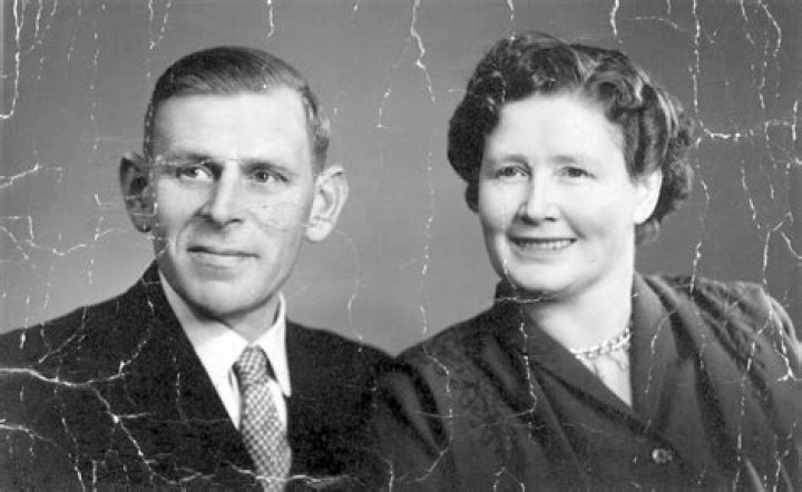 an old black and white photo of a family