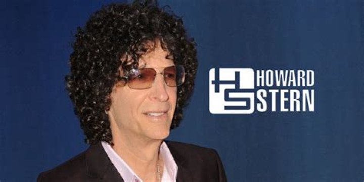 Howard Stern's wife Beth Ostrosky flashes tummy at husband's 60th